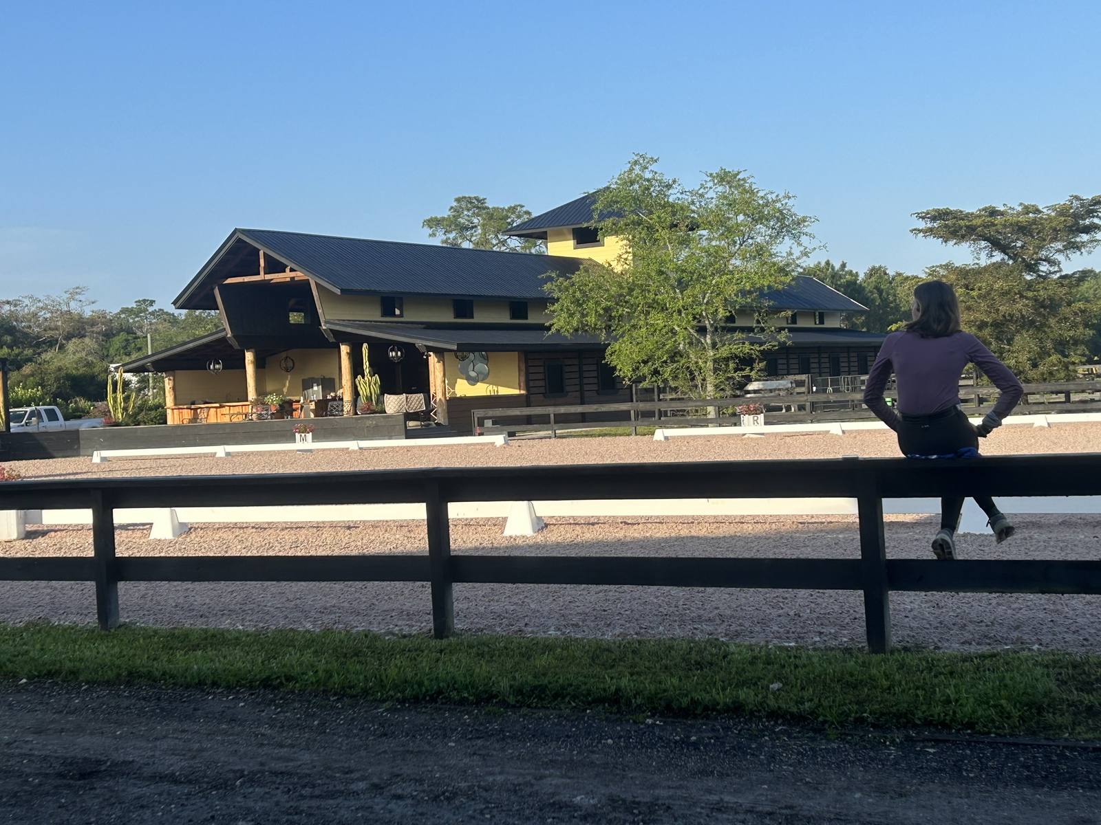 Looking out over the arena toward the barn
