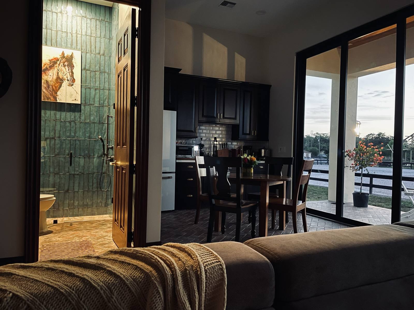 The living quarters with open kitchen and dining