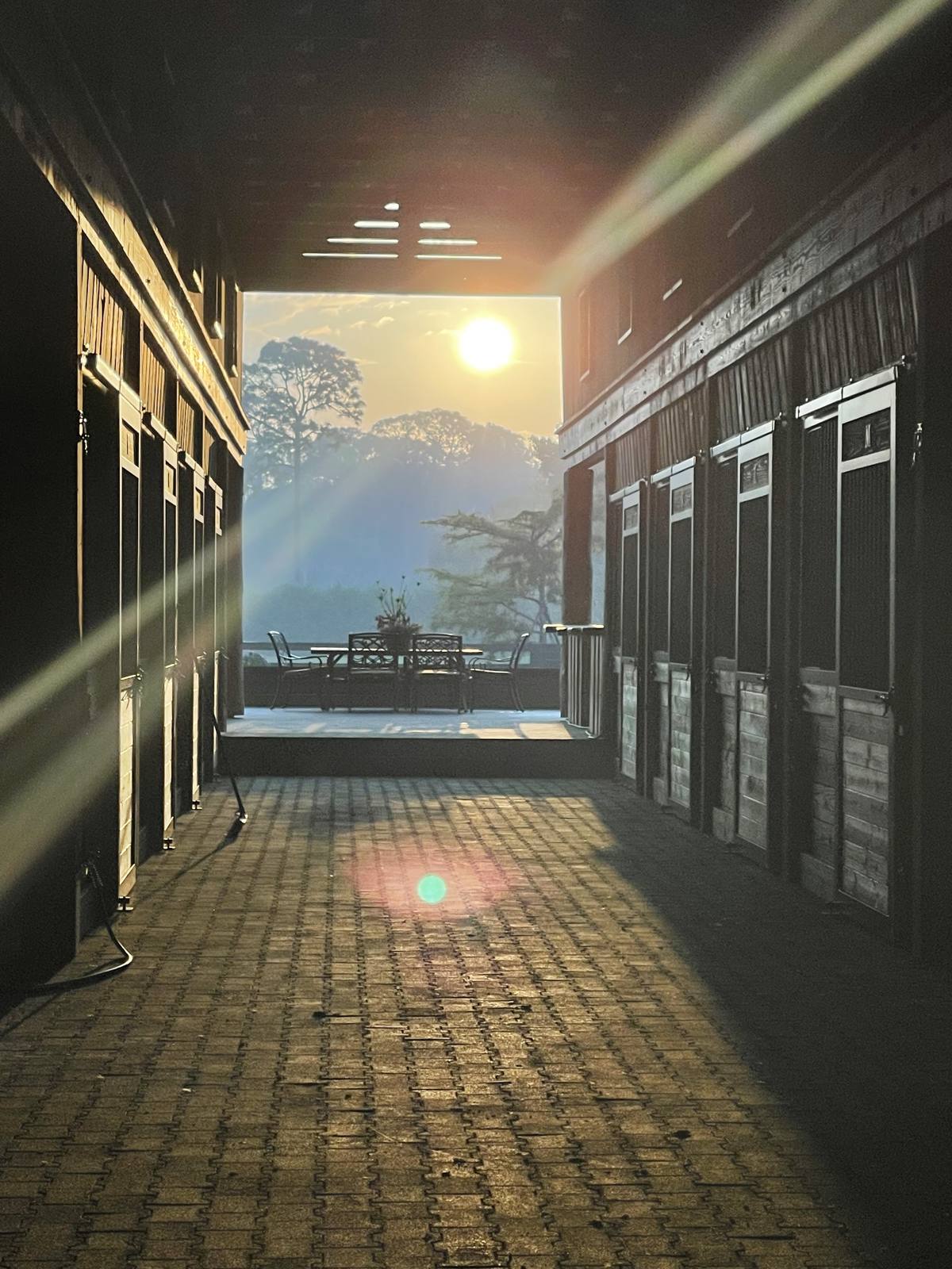 The barn aisle at sunset