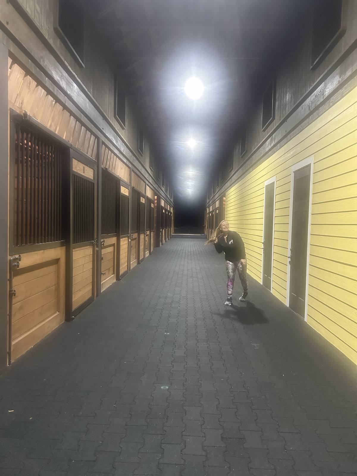 The main barn aisle at night