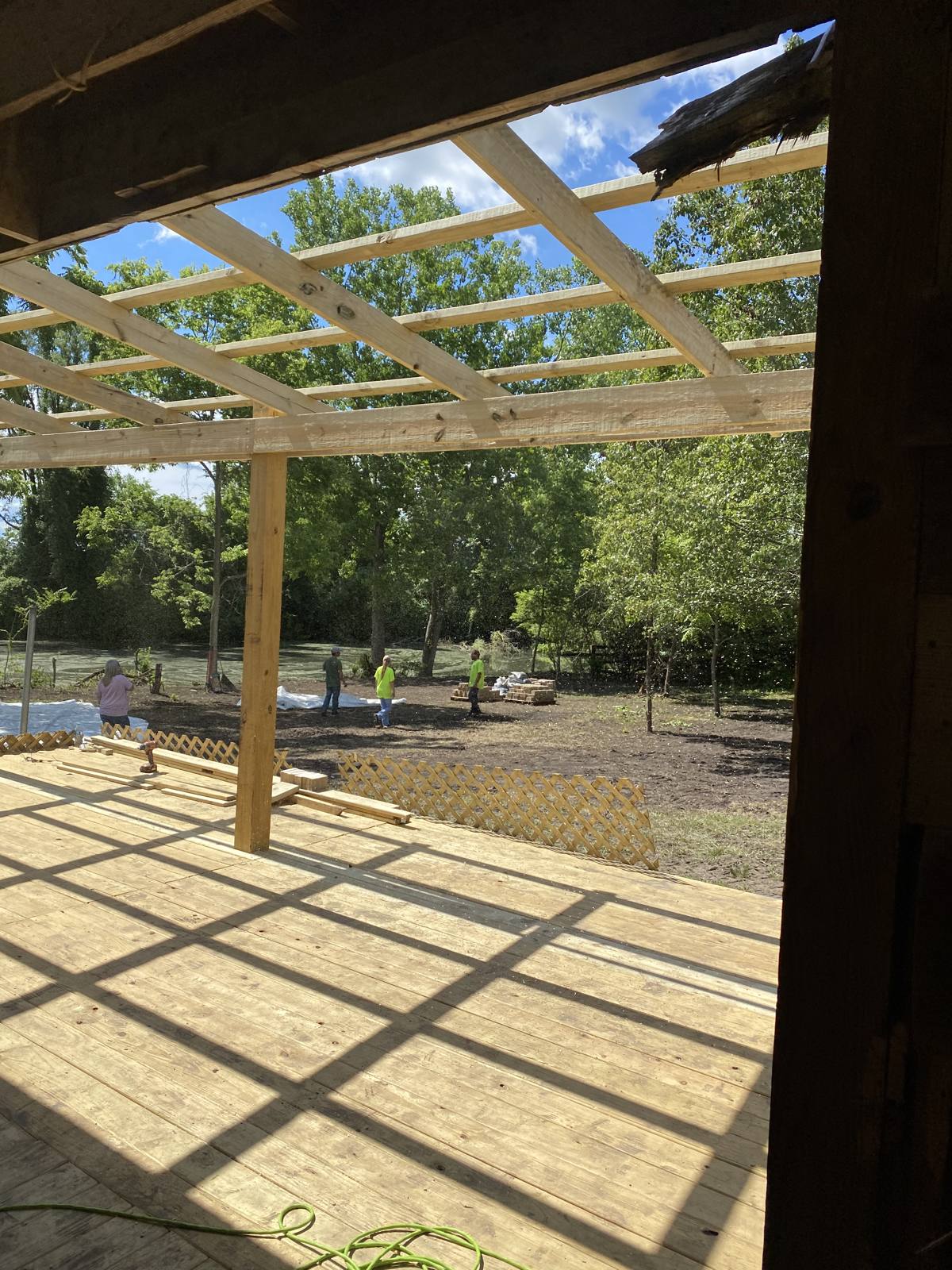 New roof framing going up over the deck