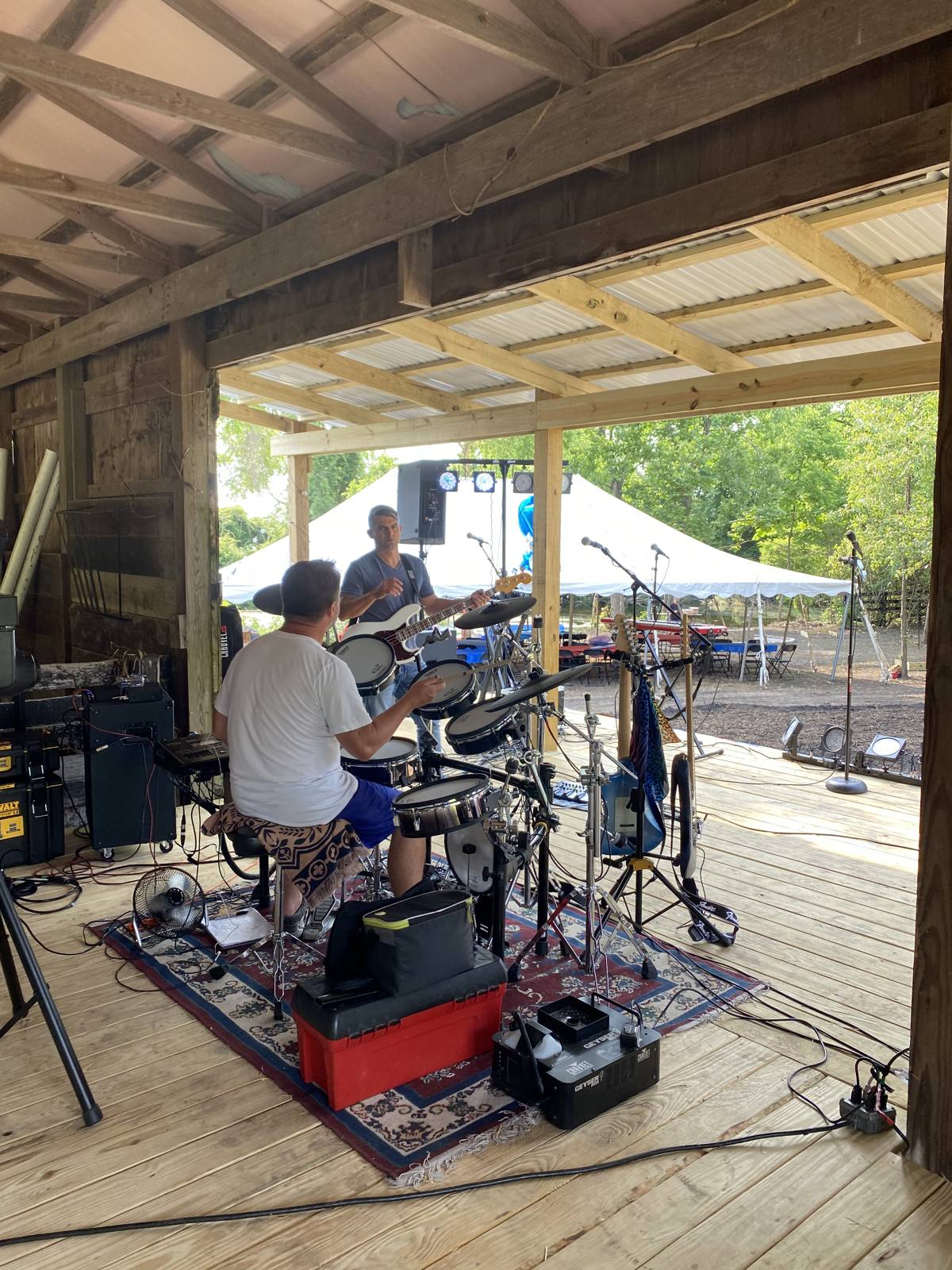 Band members running a soundcheck on the stage